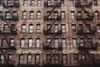 A close-up of a row of apartment buildings.