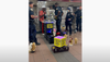 Breathe Easy, the NYPD and MTA Have at Last Apprehended the Feared Subway Saxophone Robot Animals Guy
