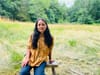 Sarahana Shrestha, the Democratic nominee for NY state Assembly District 103 in the Hudson River Valley, sits on a stool in a