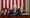 President Biden stands between Vice President Kamala harris and Speaker of the House Kevin McCarthy while delivering his stat